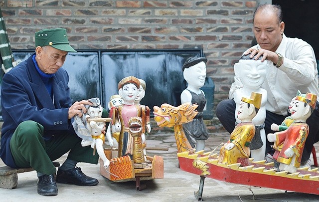Кукольный театр на воде в деревне Донгнгы - ảnh 2