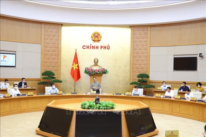 Премьер-министр Фам Минь Тинь председательствовал на очередном октябрьском заседании правительства - ảnh 1