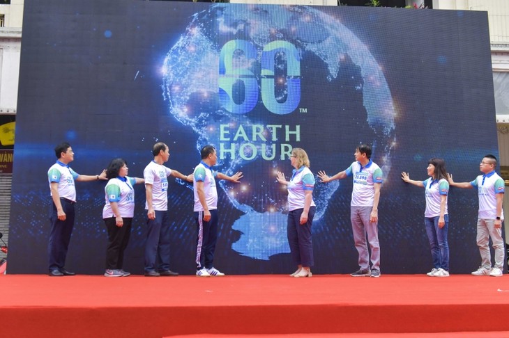 Акция «Час Земли 2023» привлекает большое количество молодых людей - ảnh 1