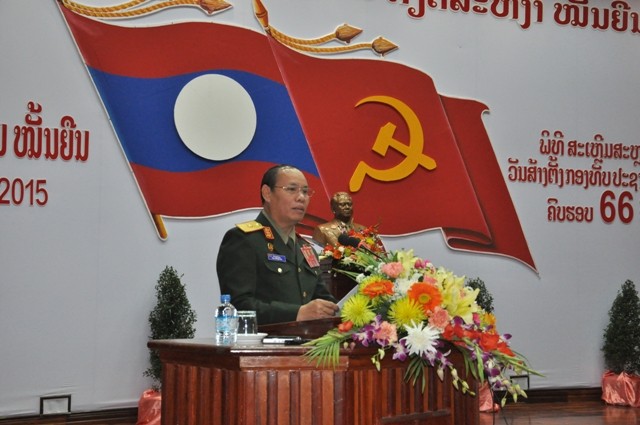 Mít tinh kỷ niệm 66 năm ngày thành lập Quân đội nhân dân Lào - ảnh 1