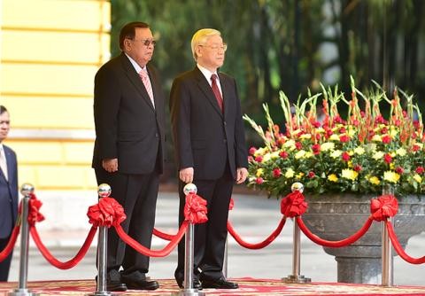 Tổng Bí thư, Chủ tịch nước Lào gửi điện cảm ơn lãnh đạo Việt Nam - ảnh 1