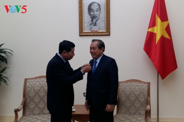 Phó Thủ tướng Thường trực Trương Hòa Bình tiếp Chánh án Tòa án nhân dân tối cao Lào  - ảnh 1