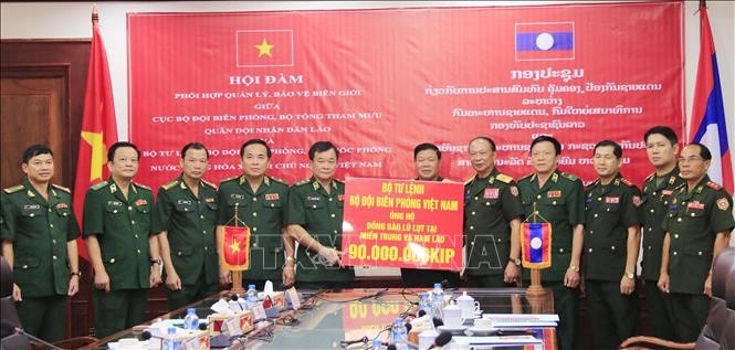 Việt Nam - Lào nhất trí đẩy mạnh hợp tác giữ gìn an ninh, biên giới - ảnh 1