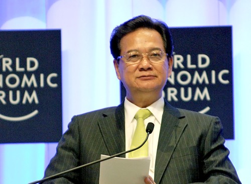 PM Nguyen Tan Dung menghadiri WEF East Asia 2014 - ảnh 1