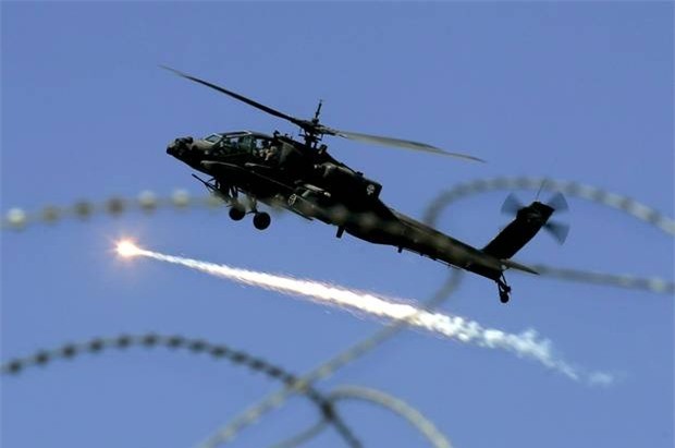 Amerika Serikat  menggelarkan helikopter dalam serangan udara kepada IS - ảnh 1