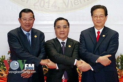 PM Vietnam, Laos dan Kamboja sepakat memperluas kerjasama daerah Segitiga Perkembangan - ảnh 1