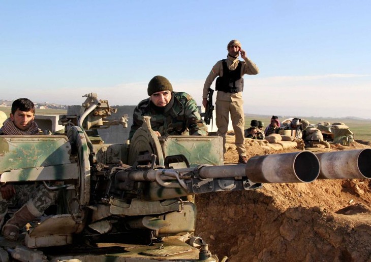 Irak menduduki lagi 25-30% wilayah dari tangan  IS - ảnh 1