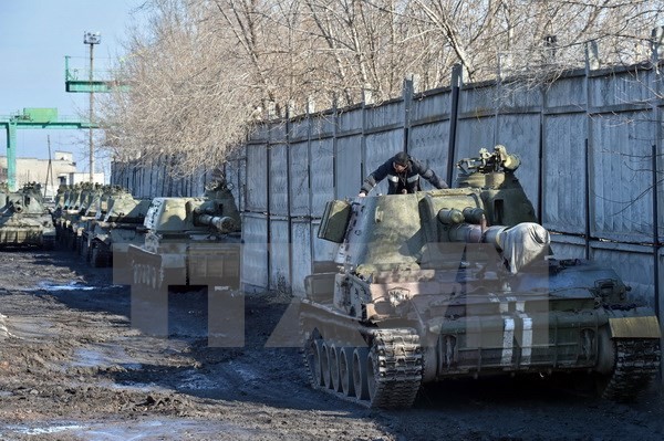 Kelompok kontak tentang Ukraina sepakat terus menarik senjata - ảnh 1