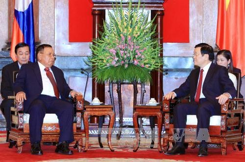 Presiden Truong Tan Sang menerima Wakil Presiden Laos, Bounnhang Volachit - ảnh 1