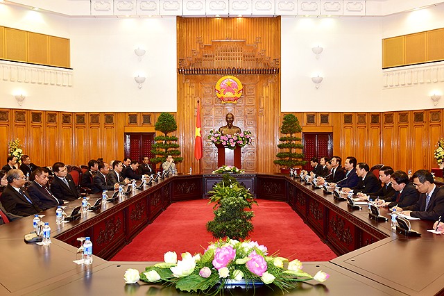 PM Nguyen Tan Dung menerima para kepala delegasi internasional - ảnh 1