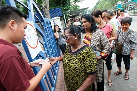 Pemilu Singapura: PAP merebut kemenangan dengan 83 kurrsi di Parlemen - ảnh 1