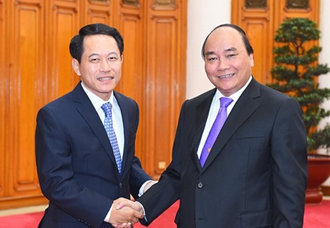 PM Nguyen Xuan Phuc menerima Menlu Laos, Saleumxay Kommasith - ảnh 1