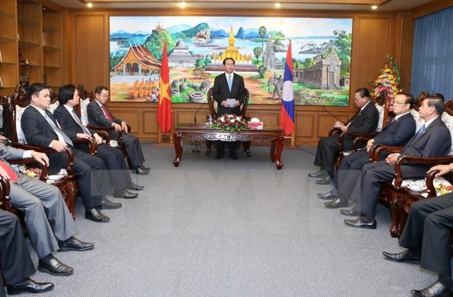 Presiden Tran Dai Quang melakukan kunjungan di propinsi Champasak - ảnh 1