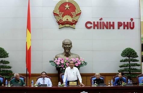 Deputi PM Truong Hoa Binh menerima delegasi orang yang berjasa dengan revolusi propinsi Ca Mau - ảnh 1