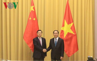 Presiden Tran Dai Quang menerima Ketua Komite Tetap KRN Tiongkok, Zhang Dejiang - ảnh 1