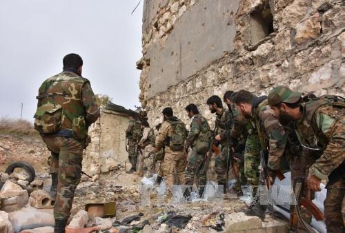 Tentara Suriah merebut kembali daerah-daerah di Damascus - ảnh 1