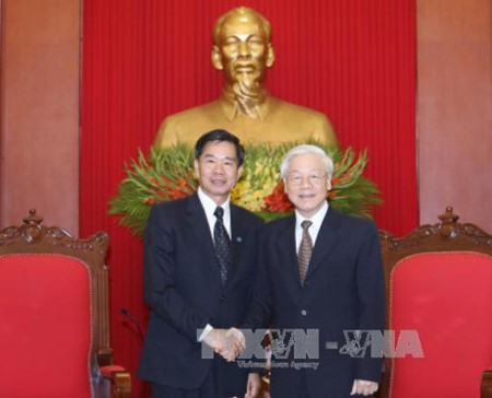 Sekjen KS PKV, Nguyen Phu Trong menerima Sekretaris Komite Partai Kota, Walikota Vientiane, Laos, Sinlavong Khoutphaythoune - ảnh 1
