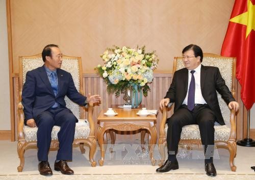  Deputi PM Trinh Dinh Dung menerima Ketua, Direktur Utama KOSPO - ảnh 1