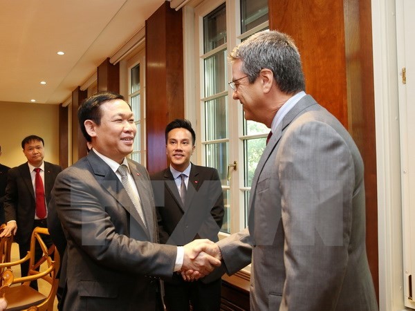  Deputi PM Vietnam, Vuong Dinh Hue melakukan temu kerja dengan pemimpin WTO di Jenewa - ảnh 1