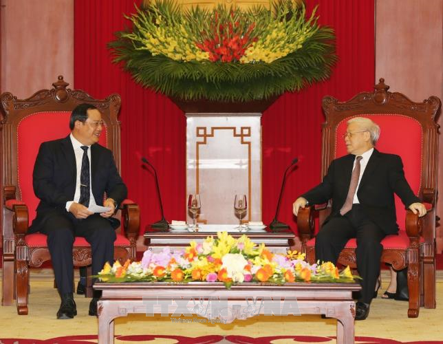  Sekjen KS PKV Nguyen Phu Trong dan PM Nguyen Xuan Phuc menerima Deputi PM Laos, Sonexay Siphandone - ảnh 1