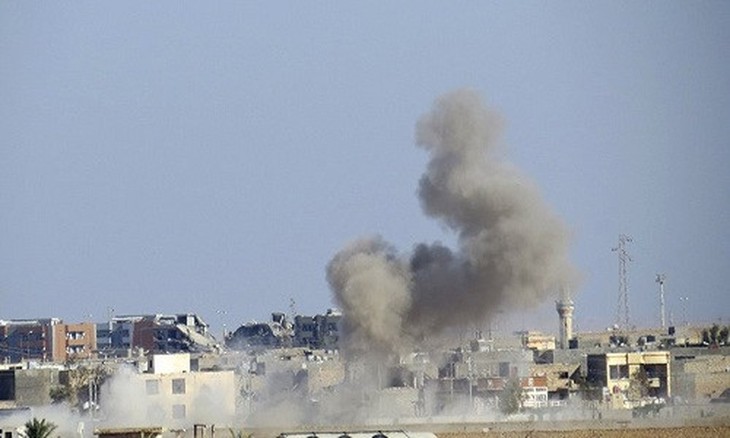 Pasukan koalisi pimpinan AS melakukan serangan udara terhadap satu sasaran tentara Suriah - ảnh 1