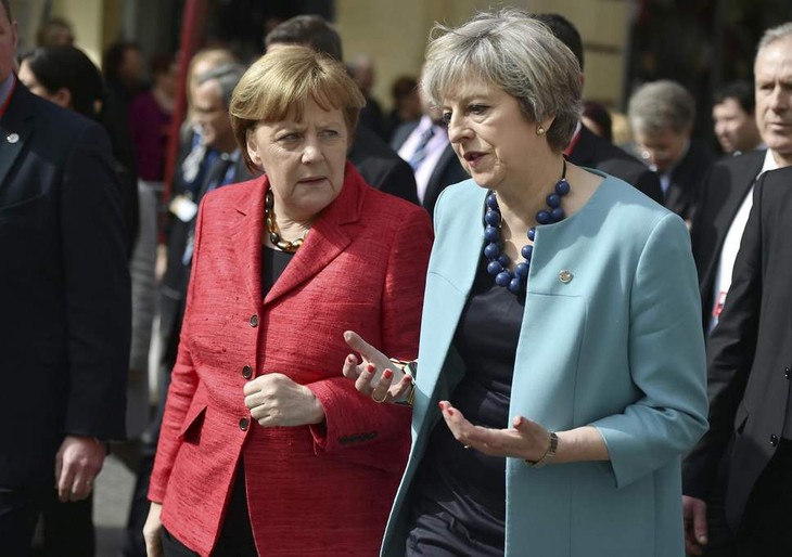 PM Inggris mendapat dukungan dari kabinet baru dan Kanselir Jerman. - ảnh 1