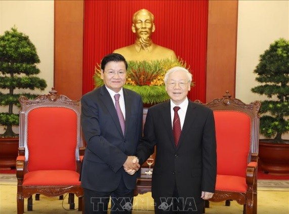 Sekjen KS PKV, Nguyen Phu Trong menerima PM Laos, Thongloun Sisoulith - ảnh 1