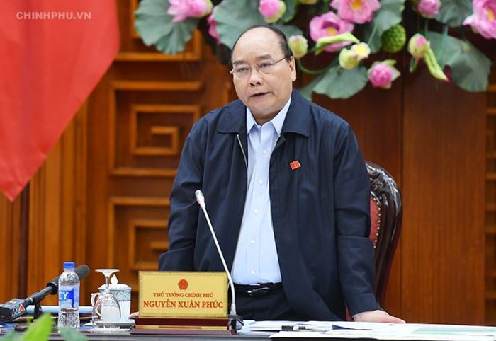 PM Nguyen Xuan Phuc memimpin sidang tentang kawasan yang menglaami kelongsoran di Vietnam Tengah - ảnh 1