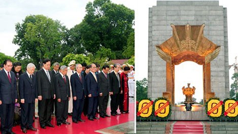 Party, State leaders pay tribute to martyrs  - ảnh 1