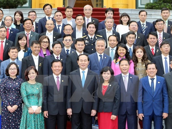 President Tran Dai Quang receives businesses of national brands - ảnh 1