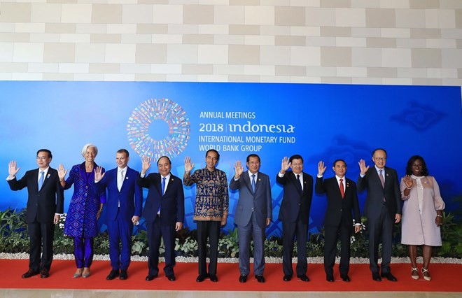 PM attends opening session of IMF-WB annual meetings, receives IMF Managing Director - ảnh 1