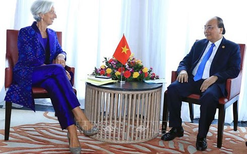 PM attends opening session of IMF-WB annual meetings, receives IMF Managing Director - ảnh 2