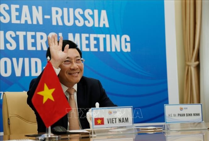 Vietnam suggests ASEAN, Russia strengthen cooperation, co-exist with COVID-19 risks  - ảnh 1