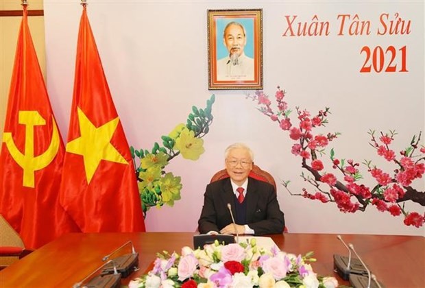 Vietnam's Party chief and President holds phone talks with newly-elected Party chief of Laos  - ảnh 1
