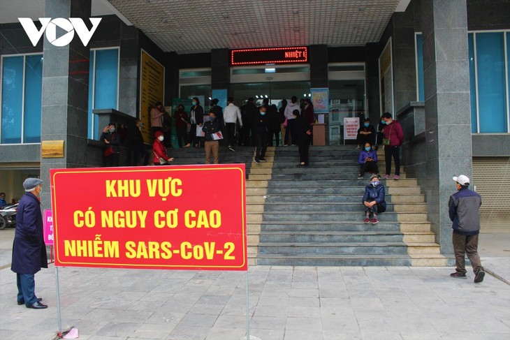 Vietnam activates stronger COVID-19 alert system as 82 more cases tested positive  - ảnh 1