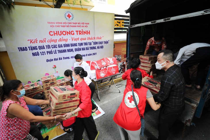 470,000 food aid bags given to people affected by COVID-19 - ảnh 1