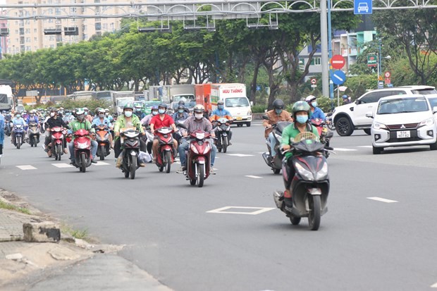 Sense of normalcy returns as COVID-19 restrictions are eased in Ho Chi Minh City - ảnh 1