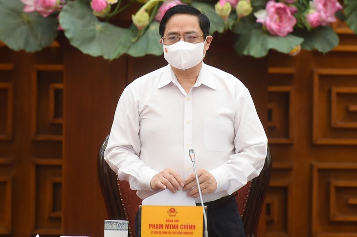 越南政府就采取防疫措施召开紧急会议 - ảnh 1