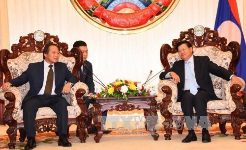 นายกรัฐมนตรีลาวเสนอให้ลาวและเวียดนามขยายความร่วมมือด้านความปลอดภัยทางอินเตอร์เน็ต   - ảnh 1