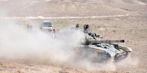 Сирийская армия взяла под контроль важный район в пригороде Дамаска - ảnh 1