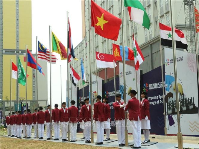Церемония поднятия флага вьетнамской сборной на Азиатских Паралимпийских играх 2018 - ảnh 1