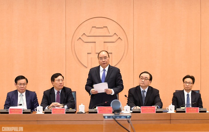 Нгуен Суан Фук председательствовал на заседании об осуществлении управления в экспериментальном порядке по модели городской администрации Ханоя - ảnh 1