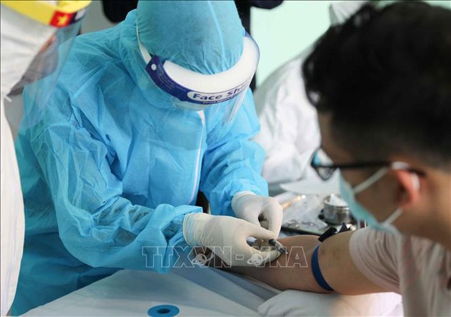 Немецкие СМИ: Вьетнам решительно противостоит повторной вспышке коронавируса - ảnh 1