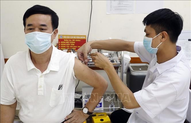 За последние сутки во Вьетнаме зарегистрировано 1039 новых случаев заражения COVID-19 - ảnh 1