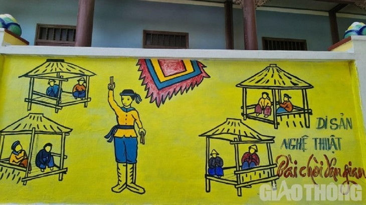 Красивые фрески в деревне Ньонли в городе Куиньон провинции Биньдинь - ảnh 11