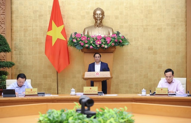 Премьер-министр Фам Минь Чинь председательствовал на очередном мартовском заседании правительства - ảnh 1