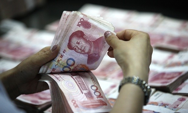 Asian market hit by China renminbi move - ảnh 1