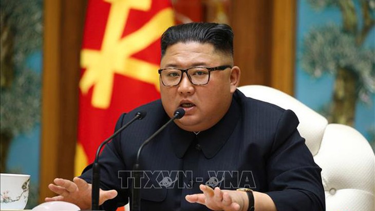 Kim Jong-un hosts military meeting - ảnh 1