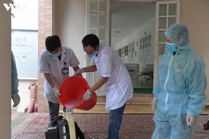 Hanoi disinfects exam sites to mitigate COVID-19 risk - ảnh 11