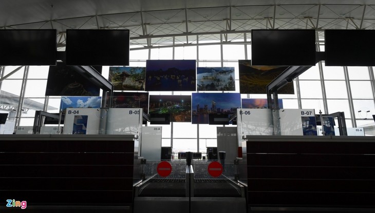 Terminal 2 of Noi Bai International Airport falls quiet - ảnh 8
